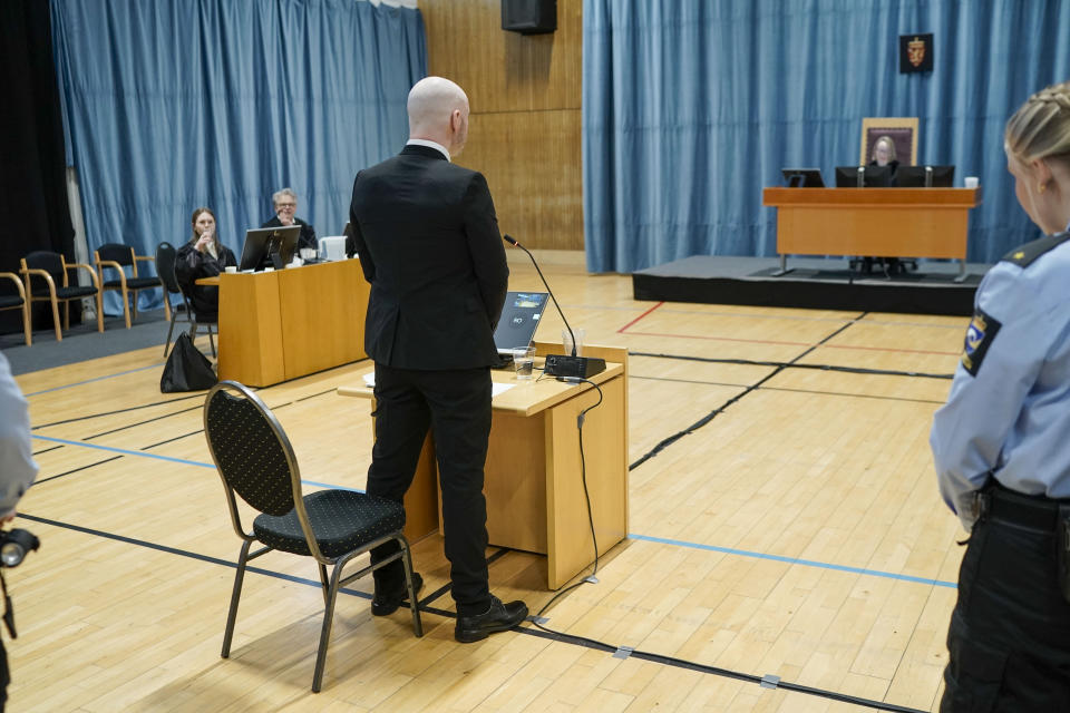 Anders Behring Breivik gives his statement on day two of the trial, where the Oslo district court hears the case concerning Breivik's prison terms and his rights under the European Convention on Human Rights, in Tyristrand, Norway, Tuesday, Jan. 9, 2024. The trial takes place in a gymnasium in Ringerike prison. Breivik, who now calls himself Fjotolf Hansen, was sentenced the year after the terrorist attacks against Oslo and Utøya on 22 July 2011 to 21 years in prison with a minimum term of 10 years. 77 people lost their lives in the attacks. (Cornelius Poppe/NTB Scanpix via AP)