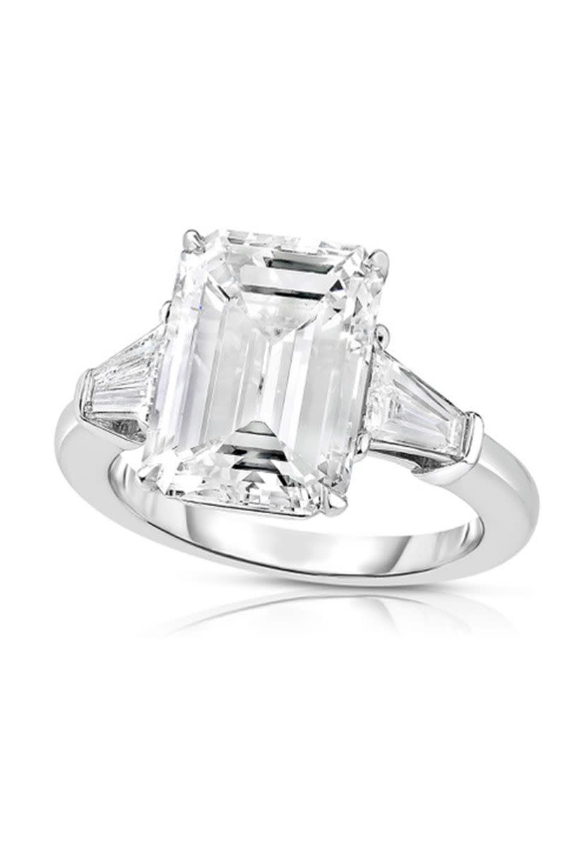 <p><em><strong>Douglas Elliott for Marisa Perry Atelier</strong> Emerald Cut Diamond Engagement Ring With Tapered Baguettes, price upon request, <a href="https://www.marisaperry.com/5-05-carat-emerald-cut-diamond-engagement-ring-with-tapered-baguettes-marisa-perry-by-douglas-elliott/" rel="nofollow noopener" target="_blank" data-ylk="slk:marisaperry.com;elm:context_link;itc:0;sec:content-canvas" class="link ">marisaperry.com</a>.</em></p><p><a class="link " href="https://www.marisaperry.com/5-05-carat-emerald-cut-diamond-engagement-ring-with-tapered-baguettes-marisa-perry-by-douglas-elliott/" rel="nofollow noopener" target="_blank" data-ylk="slk:SHOP;elm:context_link;itc:0;sec:content-canvas">SHOP</a></p>