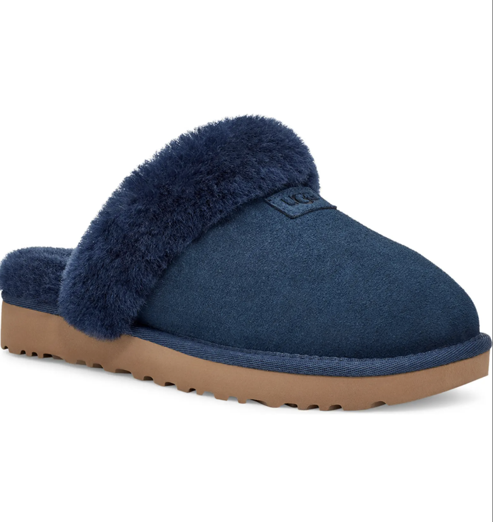 <p><strong>UGG</strong></p><p>nordstrom.com</p><p><strong>$69.90</strong></p><p><a href="https://go.redirectingat.com?id=74968X1596630&url=https%3A%2F%2Fwww.nordstrom.com%2Fs%2F5868136&sref=https%3A%2F%2Fwww.cosmopolitan.com%2Fstyle-beauty%2Ffashion%2Fg41428232%2Fnordstrom-black-friday-cyber-monday-deals-2022%2F" rel="nofollow noopener" target="_blank" data-ylk="slk:Shop Now;elm:context_link;itc:0;sec:content-canvas" class="link ">Shop Now</a></p><p>I know you've been thinking about whether or not you should buy yourself some UGG slippers, but this is your sign to <em>definitely</em> make the move! Snag 'em now (in this beautiful navy color) while they're less than a hundred bucks and still in stock.</p>