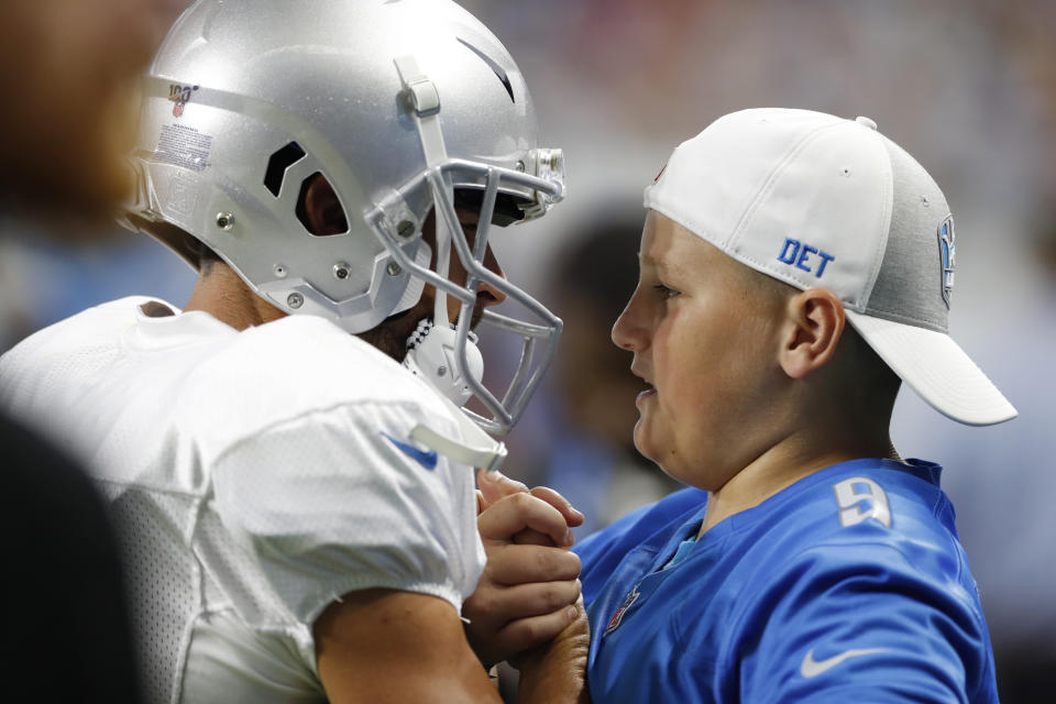 Detroit Lions wide receiver Danny Amendola greets Calder Hodge of Magnolia, Texas before an open practice at Ford Field on Friday in Detroit.