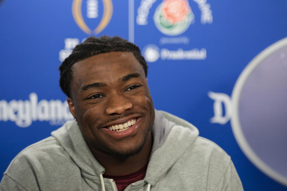 Alabama quarterback Jalen Milroe speaks to reporters during a welcome event at Disneyland on Wednesday, Dec. 27, 2023, in Anaheim, Calif. Alabama is scheduled to play against Michigan on New Year's Day in the Rose Bowl, a semifinal in the College Football Playoff. (AP Photo/Ryan Sun)