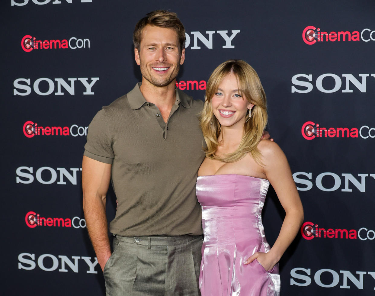 LAS VEGAS, NEVADA - APRIL 24: Glen Powell (L) and Sydney Sweeney promote the upcoming film 