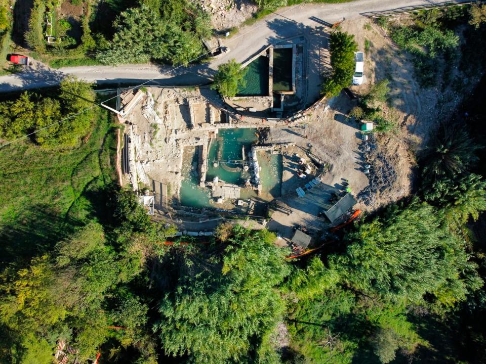 Archaeologists work at the site of the discovery of two dozen well-preserved bronze statues from an ancient Tuscan thermal spring in San Casciano dei Bagni, central Italy, in this update photo made available by the Italian Culture Ministry, Friday, Sept. 23, 2022.