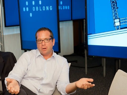 David Schwartz, Oblong Industries vice president for sales, speaks at the Washington offices of the Los Angeles-based software company in June 2012. The software behind the film "Minority Report" -- where Tom Cruise speeds through video on a large screen using only hand gestures -- is making its way into the real world