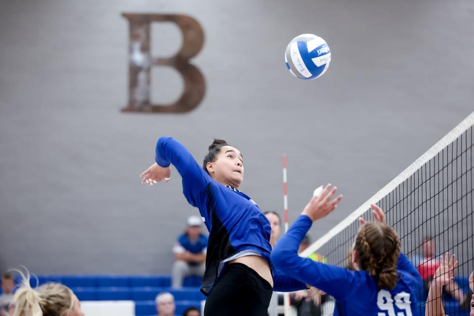 Bingham’s Solia Angilau spikes the ball toward Mountain Ridge in a volleyball match in South Jordan on Tuesday, Sept. 12, 2023. | Spenser Heaps, Deseret News
