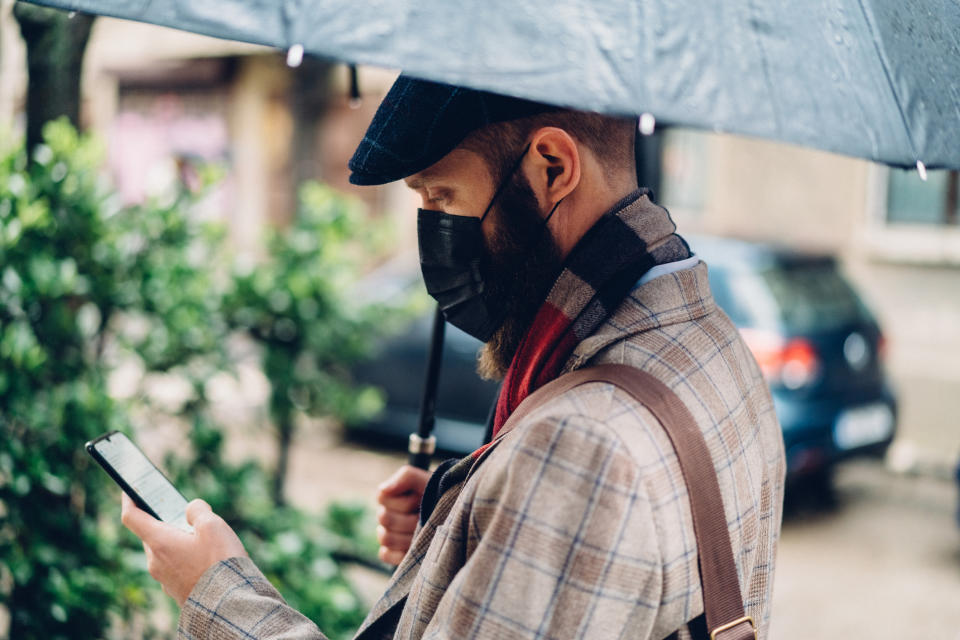 Businessman in the city is wearing mask for protection against coronavirus