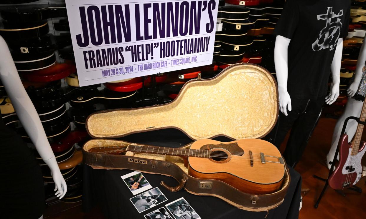 <span>John Lennon's Framus 12-string Hootenanny acoustic guitar on display in the music icons sale at the Hard Rock Cafe in New York.</span><span>Photograph: Erik Pendzich/Rex/Shutterstock</span>