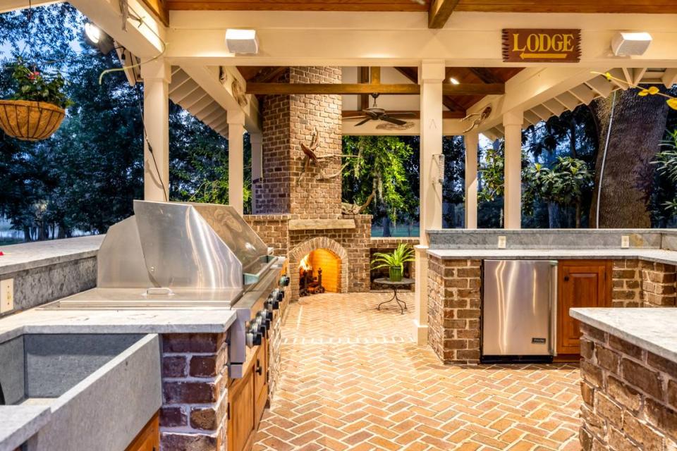 An interior cabana view displaying an entertainer’s outdoor kitchen found at 95 Gascoigne Bluff Road in Bluffton, SC.