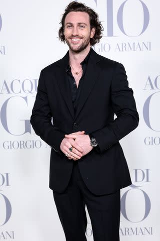 <p>Pablo Cuadra/WireImage</p> Aaron Taylor-Johnson attends the Madrid photocall for 'ACQUA DI GIO' By Giorgio Armani in 2024