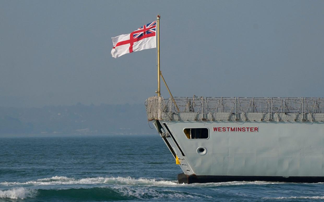 HMS Westminster, a Royal Navy Type 23 frigate, approaching Portsmouth Harbour