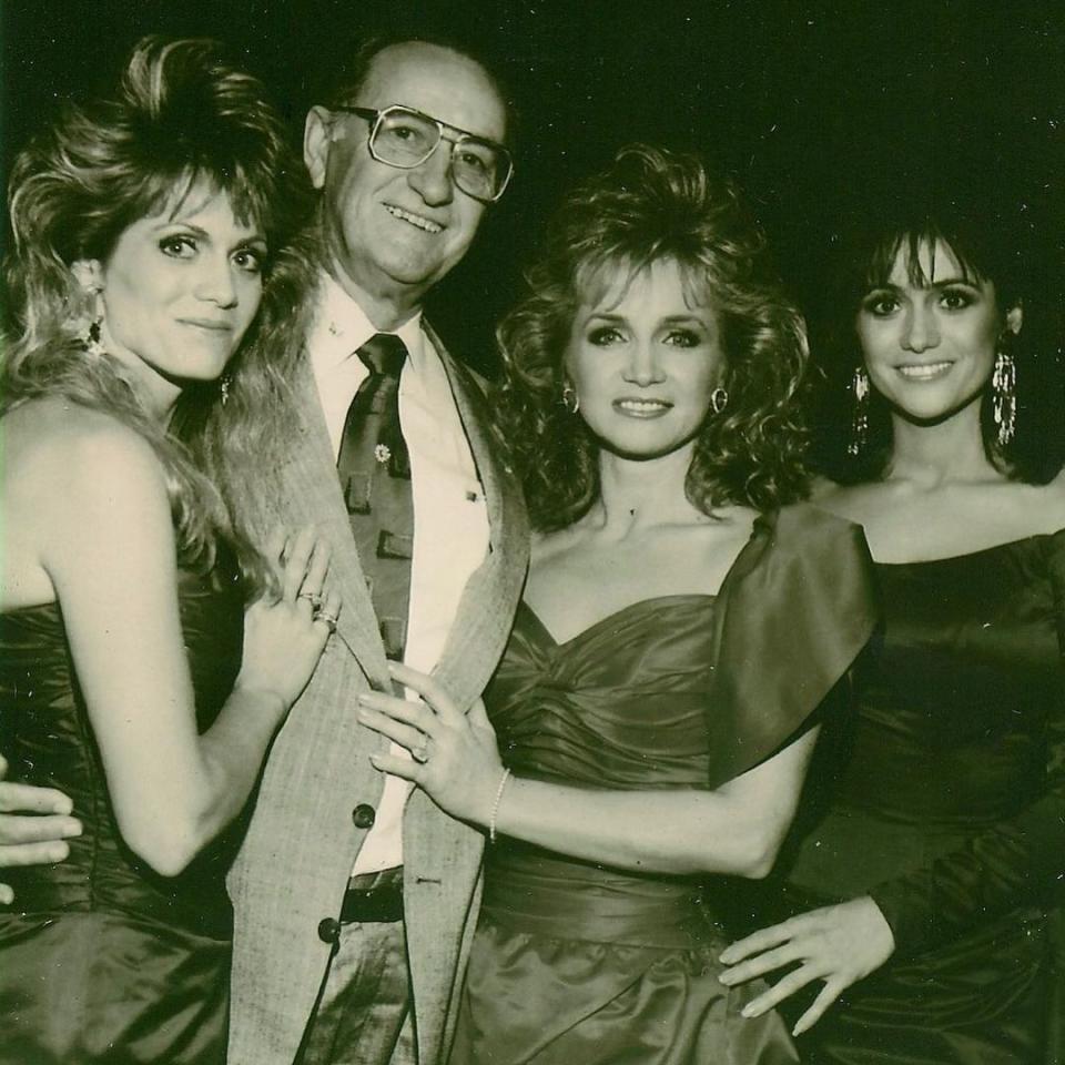 With her sisters Irene (left) and Louise (right) and their father, Irby