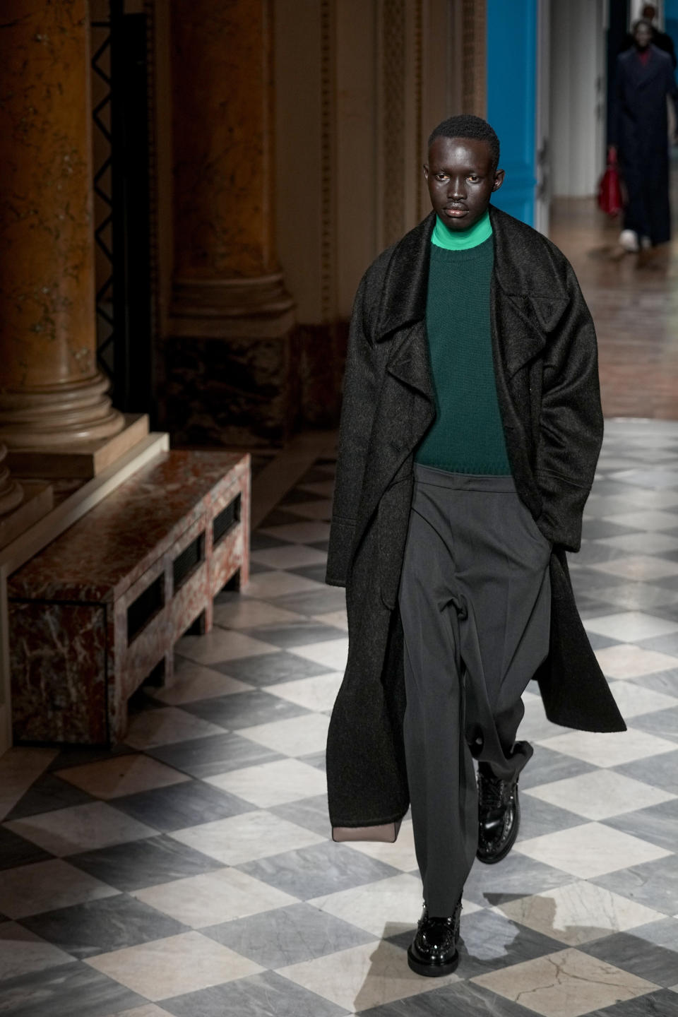 A model wears a creation for Valentino as part of the Menswear ready-to-wear Fall-Winter 2024-2025 collection presented in Paris, Saturday, Jan. 20, 2024. (AP Photo/Michel Euler)