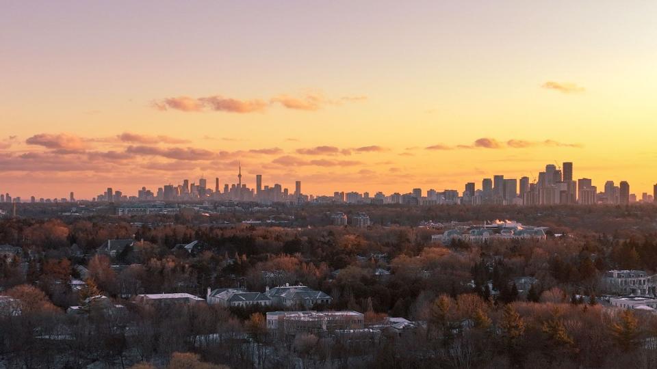 Winter sunset in Toronto, Canada with distant view of skyline