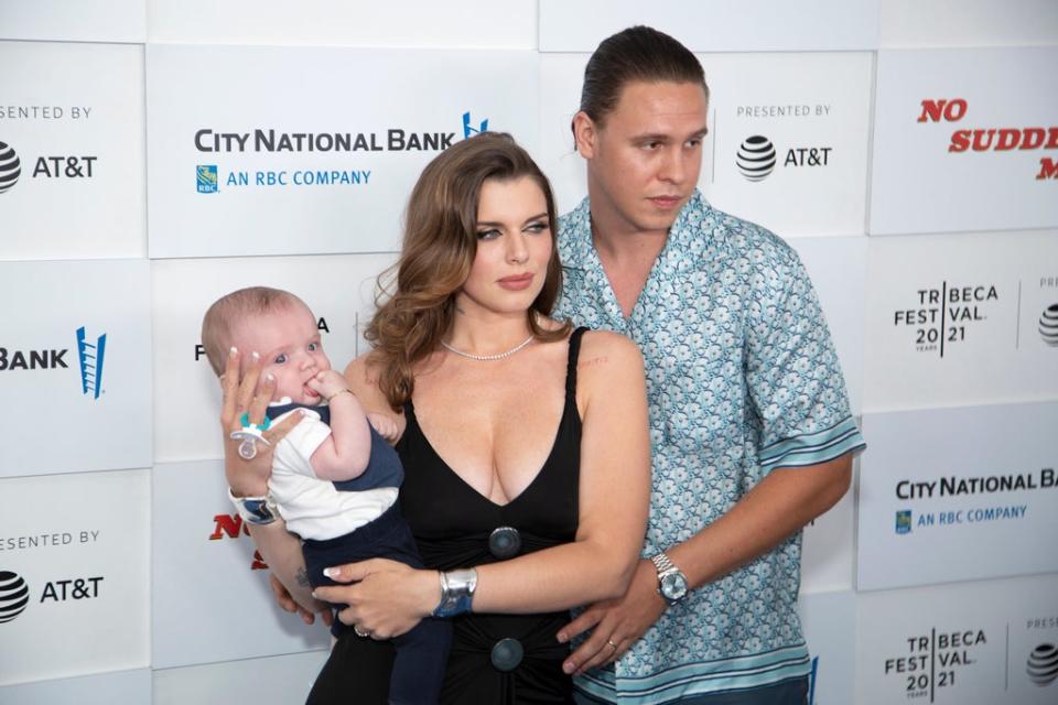 Fox and Artemiev with their son Valentino in June (Getty Images)