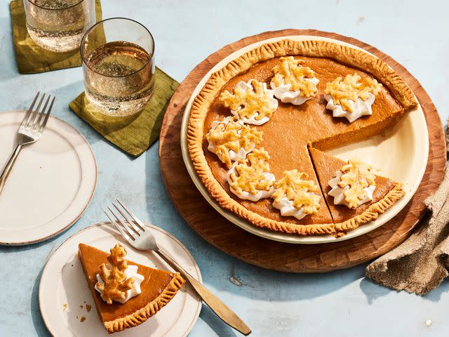 <p>VICTOR PROTASIO; FOOD STYLIST: KAREN RANKIN; PROP STYLIST: CLAIRE SPOLLEN</p> classic pumpkin pie with pie crust leaves