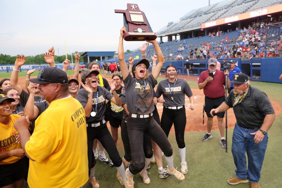 Tecumseh celebrates after winning the Class 5A slowpitch softball championship game between Washington and Tecumseh at USA Hall of Fame Stadium in Oklahoma City, Tuesday, April 30, 2024.