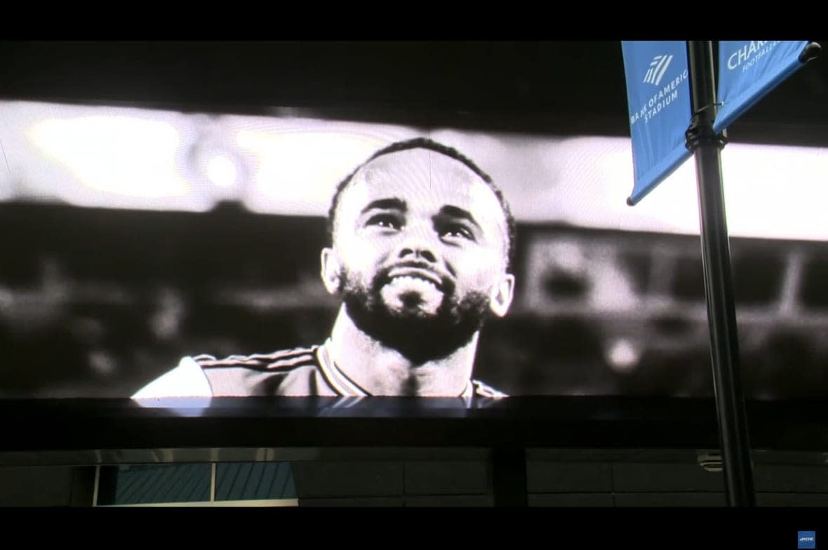 An image of Charlotte Football Club soccer player Anton Walkes is shown on Bank of America Stadium in Charlotte, N.C. (Screenshot: YouTube – WCNC)