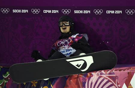 Switzerland's Iouri Podladtchikov reacts during the men's snowboard halfpipe final event at the 2014 Sochi Winter Olympic Games, in Rosa Khutor February 11, 2014. REUTERS/Dylan Martinez