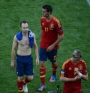 Spanish midfielder Andres Iniesta (L) reacts at the end of the Euro 2012 championships football match Spain vs Italy on June 10, 2012 at the Gdansk Arena. AFPPHOTO/ PATRIK STOLLARZPATRIK STOLLARZ/AFP/GettyImages