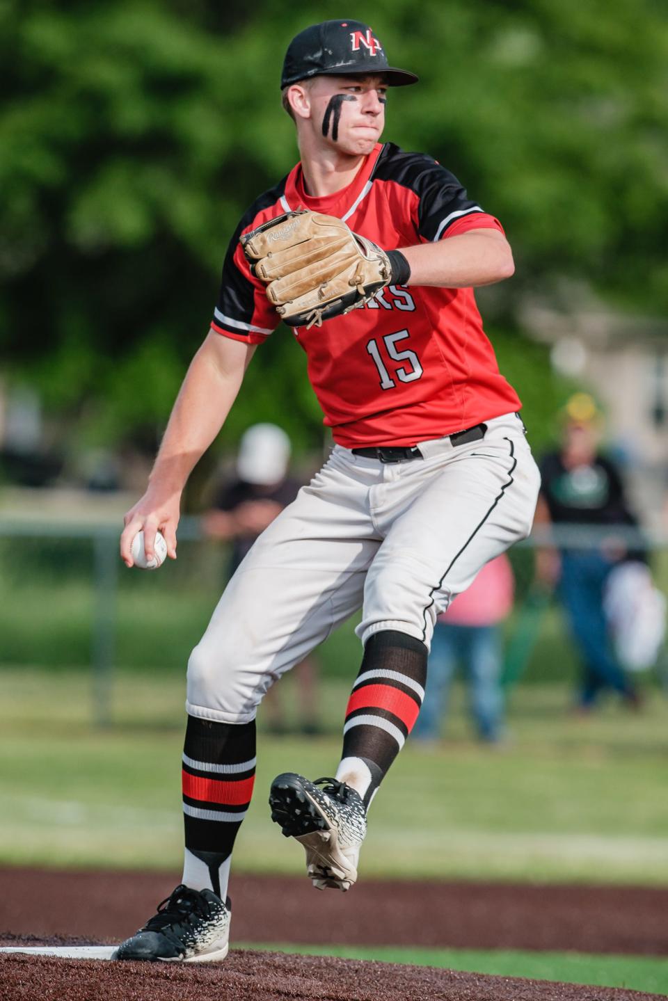 New Phila's Carter Vandall tosses in a pitch after relieving Brenton Billman in the bottom of the fifth inning against Steubenville during their Division II Regional Baseball Semifinal Game, Thursday, June 2 at Indian Valley High School.