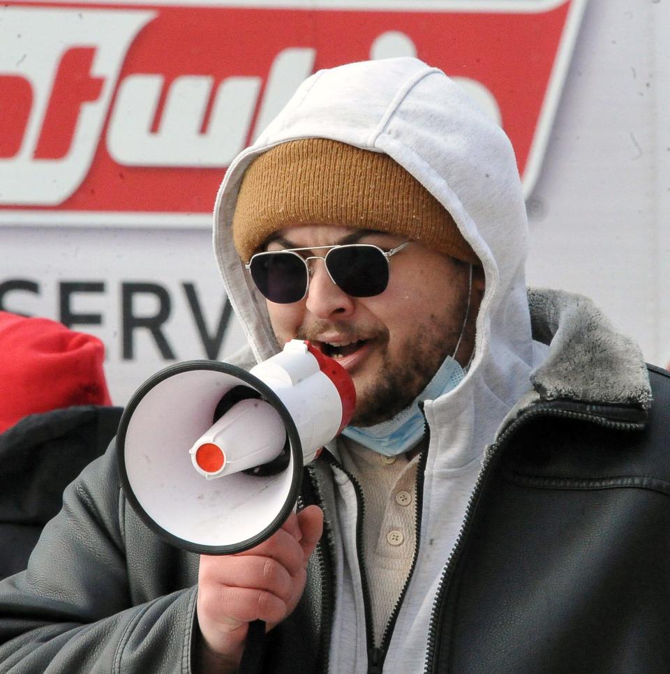 Oliver Warren, first vice president of the Wooster-Orrville NAACP, speaks to the demonstrators on Martin Luther King Jr. Day.