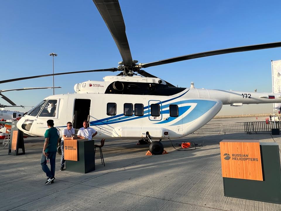 A white and blue Mi-17A3 helicopter on display at the Dubai Airshow