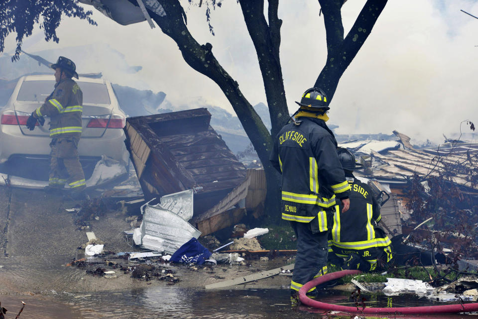 An explosion on Abbott Ave. in Ridgefield, N.J., brought mutual aid from surrounding towns to put out the fire on Monday, June 17, 2019. The lone person inside the residence apparently escaped serious injury. (Tariq Zehawi/The Record via AP)