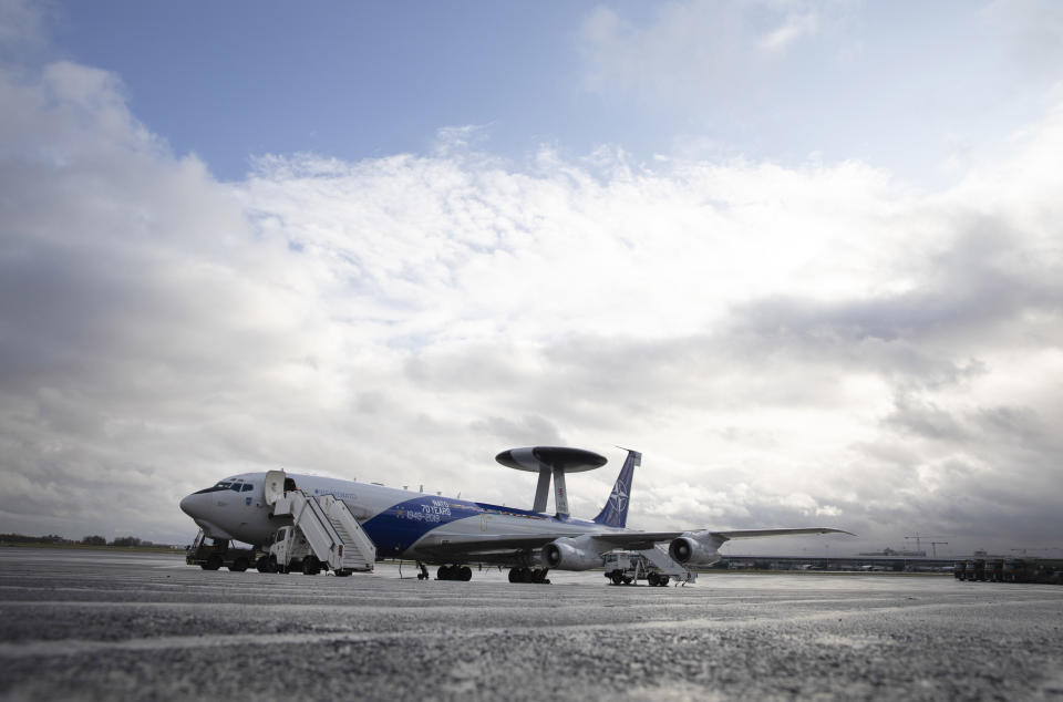 A NATO AWACS plane is parked on the runway at Melsbroek military airport in Melsbroek, Belgium, Wednesday, Nov. 27, 2019. NATO and the Boeing Company on Wednesday will mark the signing of a 1 billion US dollar contract to modernize the Alliance's fleet of AWACS aircraft. This will ensure that NATO AWACS continue to support the Alliance's missions to 2035. (AP Photo/Virginia Mayo)