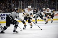 April 6, 2019; Los Angeles, CA, USA; Vegas Golden Knights center Cody Eakin (21) moves the puck against Los Angeles Kings left wing Ilya Kovalchuk (17) during the first period at Staples Center. Mandatory Credit: Gary A. Vasquez-USA TODAY Sports