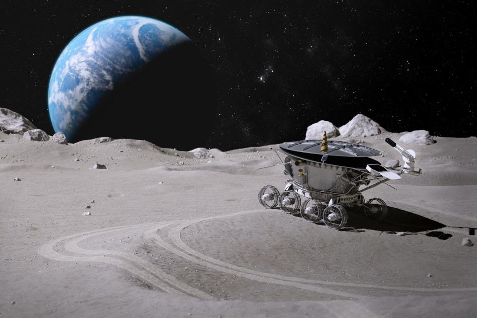 A depiction of a lunar rover on the Moon.