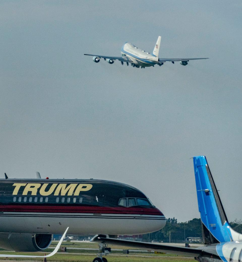 President Joe Biden leaves aboard Air Force One past Donald Trump's plane at Palm Beach International Airport after a campaign reception in Jupiter in January.