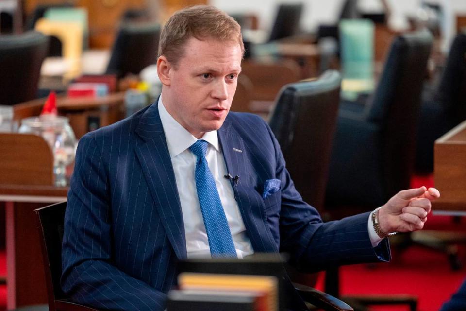 Rep. Destin Hall, a Caldwell County Republican, answers a reporter’s questions during an interview at the North Carolina Legislative Building on Thursday, March 21, 2024.