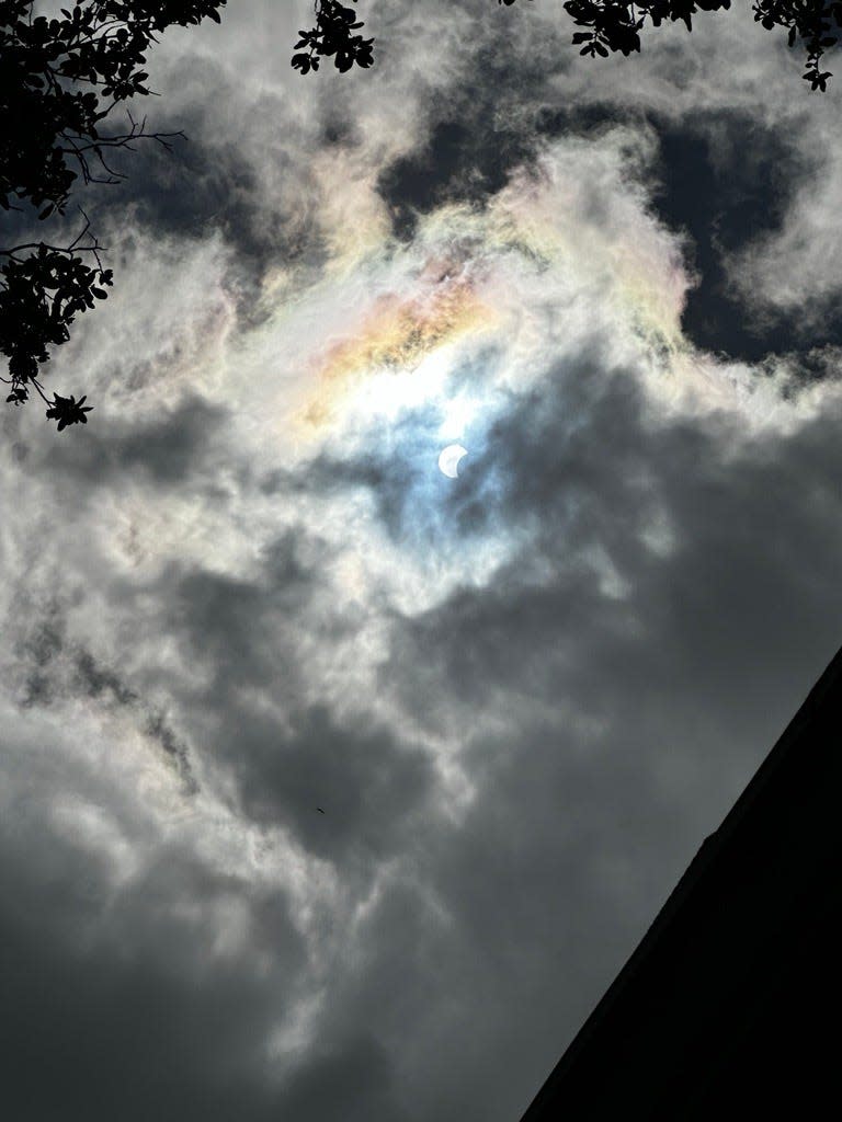 The 2024 solar eclipse as seen through the clouds in Palm Beach Gardens.