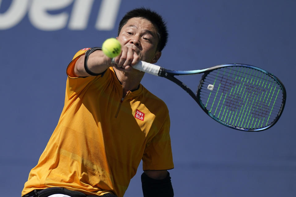 Shingo Kunieda, of Japan, returns a shot to Martin de la Puente, of Spain, during the second round of the men's wheelchair singles at the U.S. Open tennis championships, Thursday, Sept. 8, 2022, in New York. (AP Photo/Julia Nikhinson)