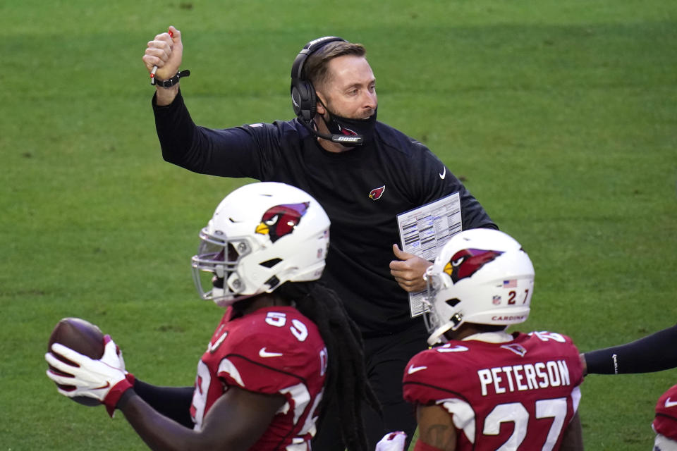 Arizona Cardinals head coach Kliff Kingsbury celebrates a safety during the first half of an NFL football game against the Philadelphia Eagles, Sunday, Dec. 20, 2020, in Glendale, Ariz. (AP Photo/Ross D. Franklin)