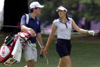 Albane Valenzuela, of Switzerland, and her brother and caddy, Alexis Valenzuela, walk the 11th fairway during a practice round prior to the women's golf event at the 2020 Summer Olympics, Monday, Aug. 2, 2021, at the Kasumigaseki Country Club in Kawagoe, Japan. (AP Photo/Matt York)