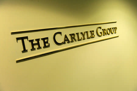 A general view of the lobby outside of the Carlyle Group offices in Washington, U.S. May 3, 2012. REUTERS/Jonathan Ernst/File Photo