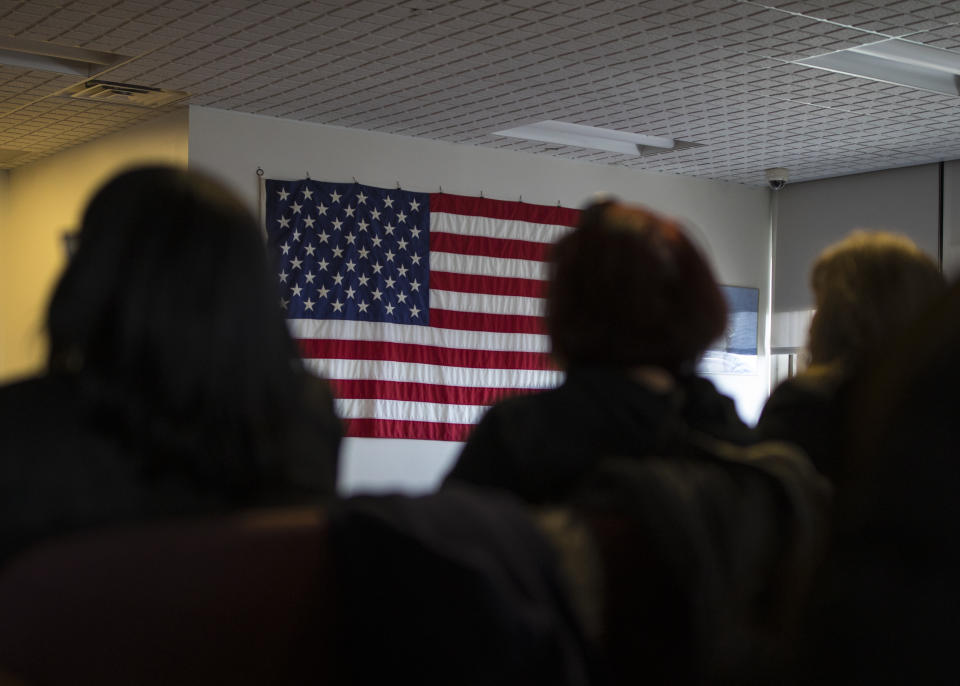 Candidates for US citizenship listen to speeches during a naturalization ceremony for new US citizens February 16, 2017 in Newark, New Jersey. Eighty-nine applicants from thirty-seven countries received their certificates of citizenship. (Robert Nickelsberg/Getty Images)