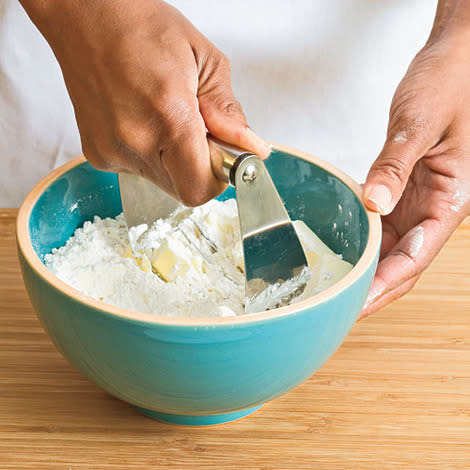 Blend cold butter into the flour