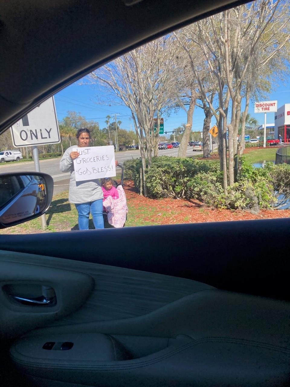A woman with a small child spent some time one day last week on Beville Road west of Nova Road trying to get the attention of passing motorists. The woman was appealing for help with groceries.