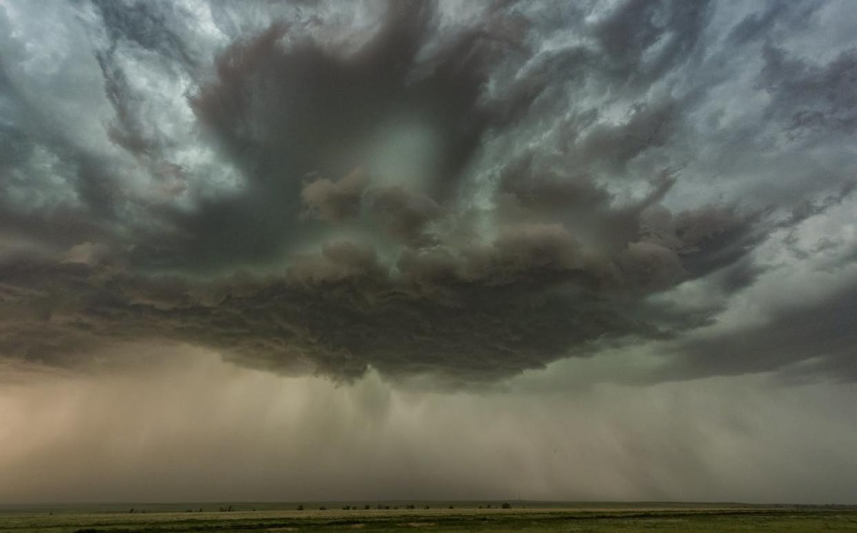 Cloud seeding can increase rainfall and reduce hail damage to crops, but its use is limited. <a href="https://www.gettyimages.com/detail/photo/colorado-supercell-royalty-free-image/1303884216?phrase=Rain+storm&adppopup=true" rel="nofollow noopener" target="_blank" data-ylk="slk:John Finney Photography/Moment via Getty Images;elm:context_link;itc:0;sec:content-canvas" class="link ">John Finney Photography/Moment via Getty Images</a>