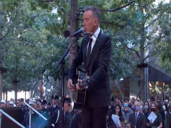 Bruce Springsteen at the 9/11 memorial in New York City (Image source: YouTube)