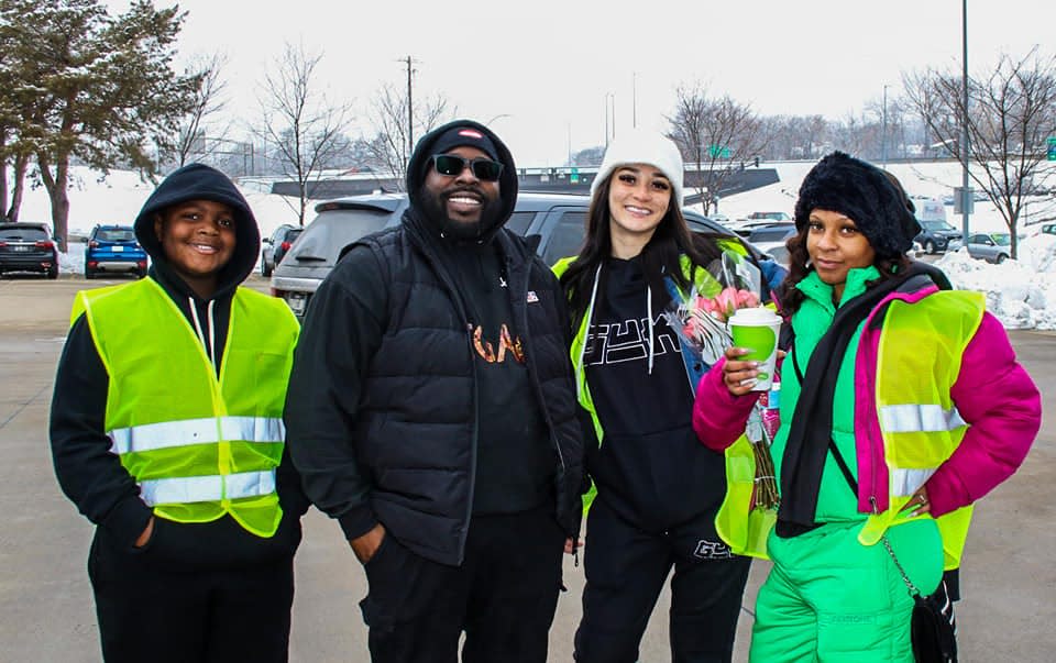 Community activist and pastor Rob Johnson (second from the left) stands beside his nephew, Sheldon Johnson; area youth organizer, Sissie Lynn Carter and local artist Nala at Kum & Go, 1300 Keo Way in Des Moines at his second annual free gas giveaway in 2023.
