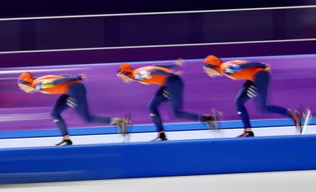 Speed Skating - Pyeongchang 2018 Winter Olympics - Women's Team Pursuit Competition - Gangneung Oval - Gangneung, South Korea - February 19, 2018. Marrit Leenstra, Ireen Wust and Antoinette De Jong of the Netherlands in action. REUTERS/Phil Noble