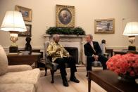 <p>President George W. Bush meets with former South African President Nelson Mandela.</p>