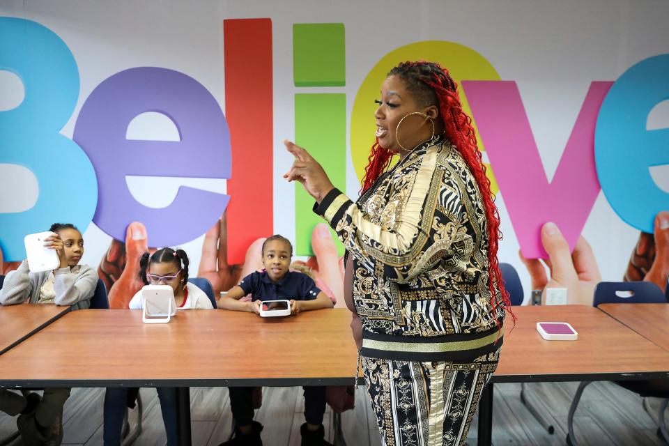 Rashida Williams, 50, of Inkster, leads the Genuinely Loving and Accepting Myself Movement (GLAM) class at the Franklin Wright Settlements after-school program at their Midtown location on Wednesday, Feb. 28, 2024.
