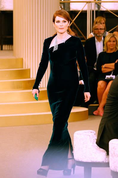 <p>Julianne Moore knows to wear jewel tones — and Karl Lagerfeld delivered a gown to the actress that quite possibly could have been made just for her. She accessorized the teal velvet gown (only worn indoors with air conditioning during the summer) with a diamond shooting star open necklace.</p>