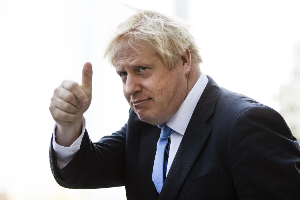 FILE - Britain's Prime Minister Boris Johnson gestures as he departs from Hudson Yards, in New York, Tuesday, Sept. 24, 2019. He was the mayor who reveled in the glory of hosting the 2012 London Olympics, and the man who led the Conservatives to a whopping election victory on the back of his mission to “get Brexit done.” But Boris Johnson’s time as prime minister was marred by his handling of the coronavirus pandemic and a steady stream of ethics allegations. (AP Photo/Matt Rourke, File)