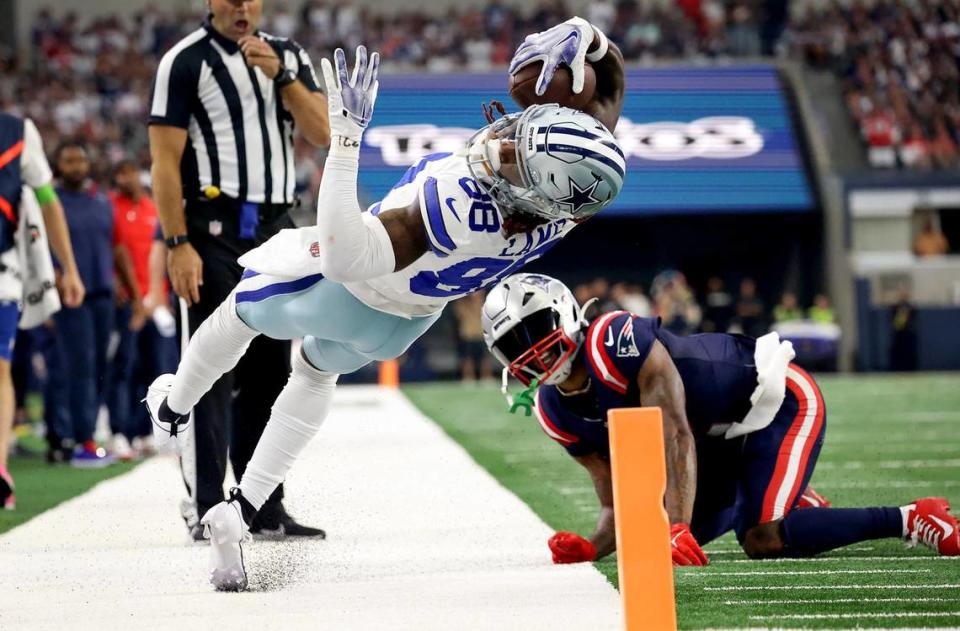 Dallas Cowboys wide receiver CeeDee Lamb attempts to stretch into the end zone while competing against the New England Patriots on Sunday, October 1, 2023, at AT&T Stadium in Arlington. Amanda McCoy/amccoy@star-telegram.com