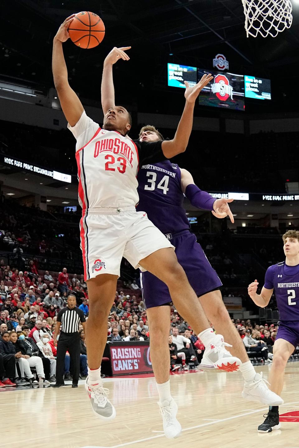 Feb 9, 2023; Columbus, OH, USA;  Ohio State Buckeyes forward Zed Key (23) grabs a rebound away from Northwestern Wildcats center Matthew Nicholson (34) during the first half of the NCAA men’s basketball game at Value City Arena. Mandatory Credit: Adam Cairns-The Columbus Dispatch